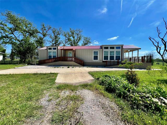711 S MAIN ST, CARBON, TX 76435, photo 1 of 40